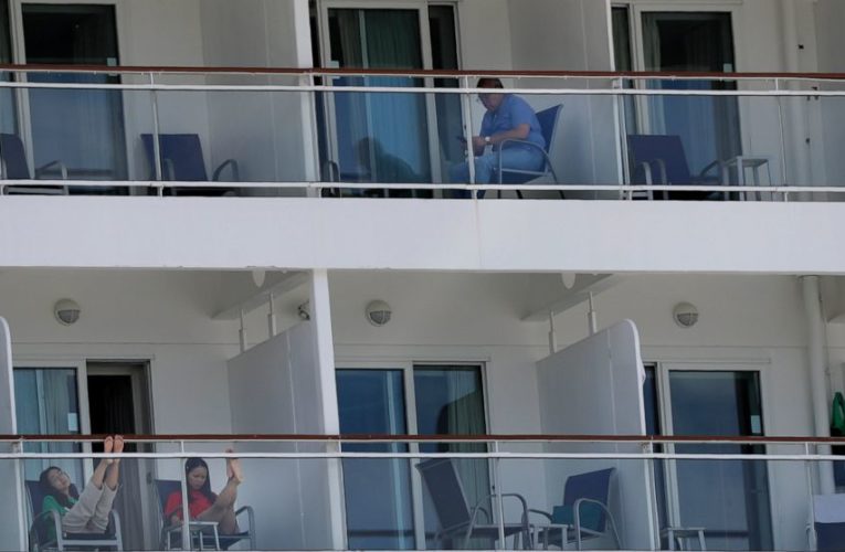 Stuck on cruise ships during pandemic, crews beg to go home