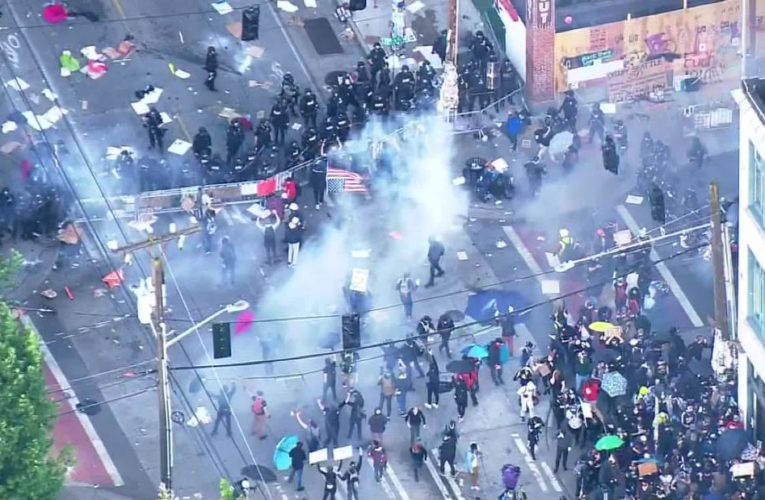 Denver Broncos lead march through the city, after head coach denies there is racism in the NFL