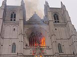 Inferno engulfs Nantes cathedral as 60 firefighters battle to save 1434 church