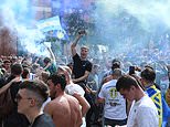 Leeds United fans celebrate Premier League promotion at non-socially distant street party