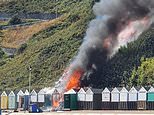 Sunbathers flee Bournemouth seafront as ‘person cooking in a beach hut’ sparks massive fire