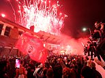 Liverpool fans turn out in their thousands as their side lift the Premier League for the first time