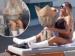 Katie Price sunbathes following plea for help to find mobility scooter after breaking her feet 