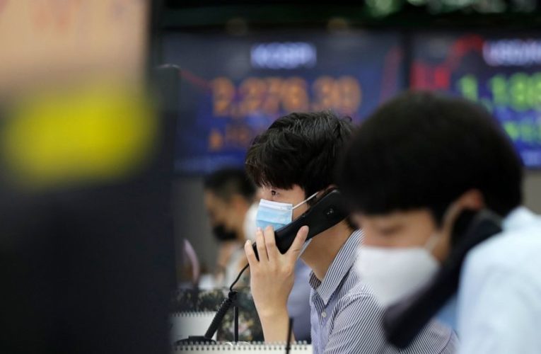 Asian benchmarks tumble, looking to earnings, central banks