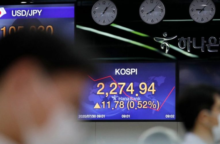 Stocks sink worldwide; Dow drops 500 points in early trading