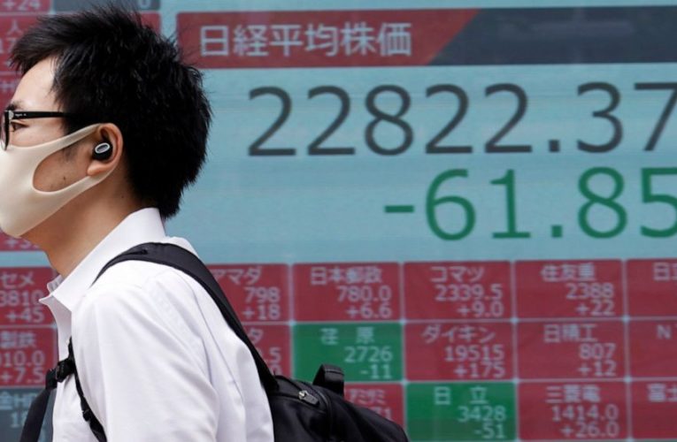 Shares mixed in Asia after Wall Street advance