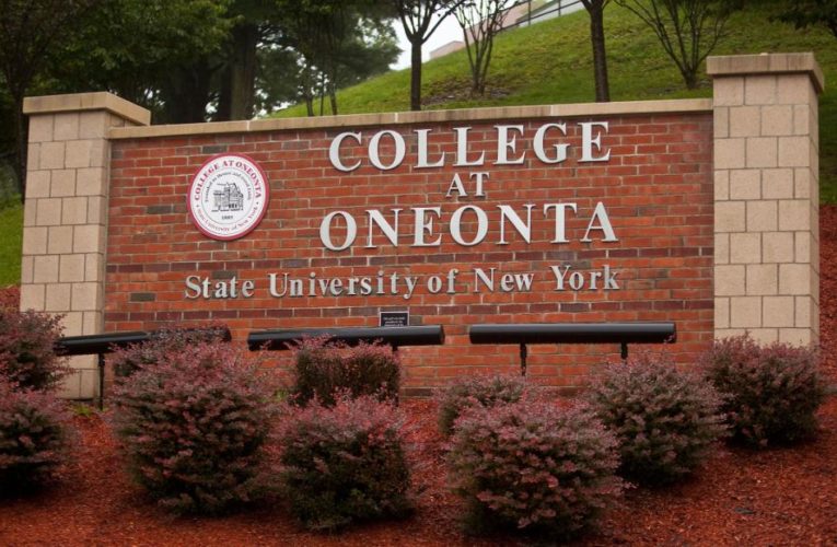 Dozens suspended after outbreak at college