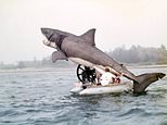 Unseen behind-the-scenes photos show Steven Spielberg’s 25ft mechanical shark during filming of Jaws