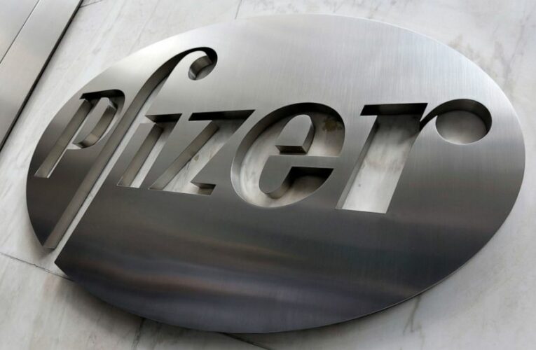 Pfizer swings to small profit as vaccines begin to roll out