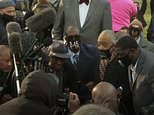 George Floyd’s brother kneels outside court as Derek Chauvin’s trial begins