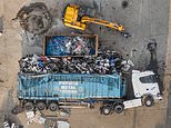 Digger driver goes on £700,000 rampage as they flip over fully-loaded 44-ton lorry