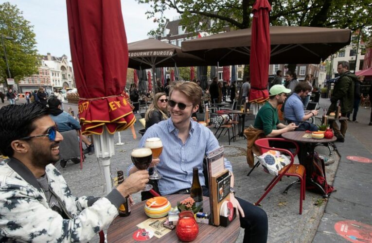 Guests flock to Dutch cafe terraces as lockdown eases