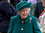 Queen looks resplendent in green coat as she arrives to open new session of the Scottish Parliament