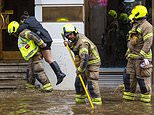 Flooding causes delays on Tube and roads are left underwater in London and Essex