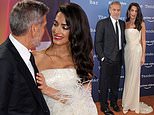 George Clooney cosies up to his wife Amal at The Tender Bar photocall at the London Film Festival