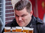 Dutch football fan, 23, goes viral for carrying 48 PINTS of beer in one go at game