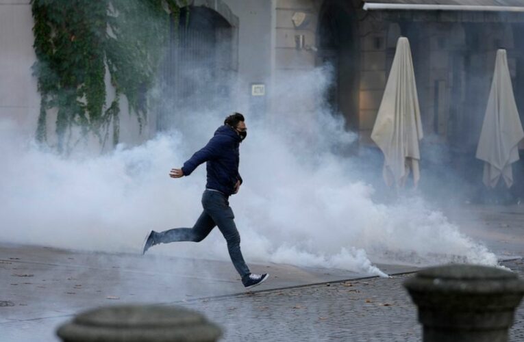 Slovenian police clash with protesters ahead of EU summit