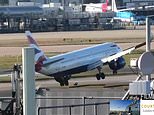 Moment BA jet’s tail ‘hits runway’ as it fails to land while Storm Corrie batters Heathrow