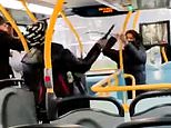 Terrifying moment teenagers fight with a knife and SWORD on a bus in south London