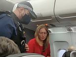 Dramatic moment armed cops force barrister and wife off BA flight after furious row with cabin crew