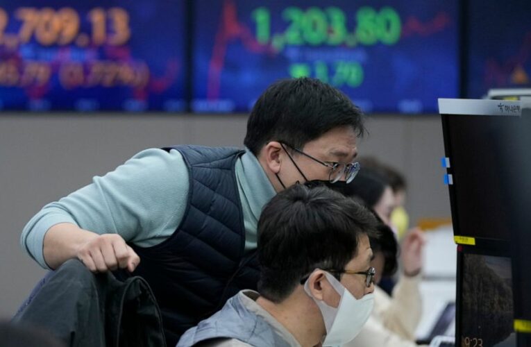 Asian shares mixed as earnings fuel gains on Wall Street