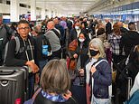 Hundreds queue at Manchester airport at dawn