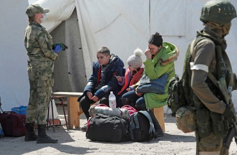 As evacuees arrive in Russian-controlled territory, one woman says she spent weeks hiding out in Soviet-era bunkers below a Mariupol steel plant