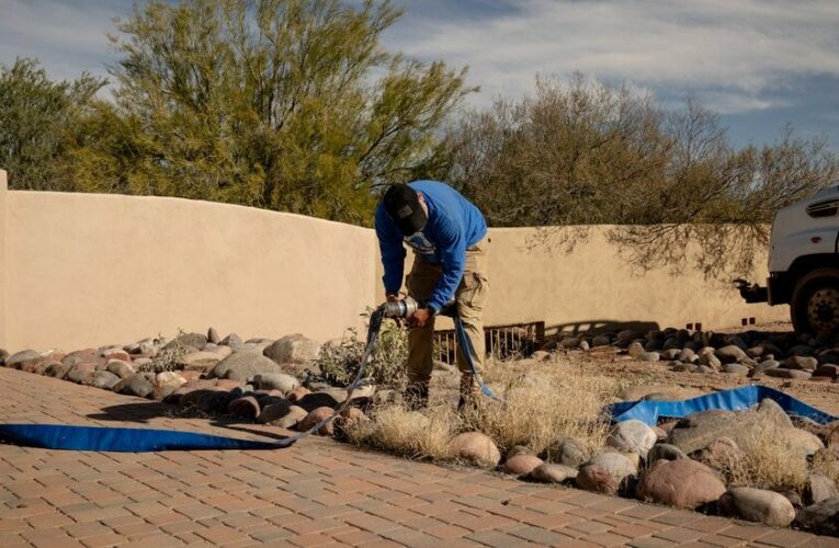 Skipped Showers, Paper Plates: An Arizona Suburb’s Water Is Cut Off